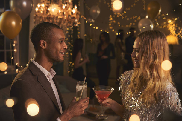 Romantic Couple Enjoying Cocktails - Фото, изображение