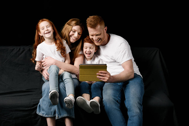 family using tablet  - Фото, изображение