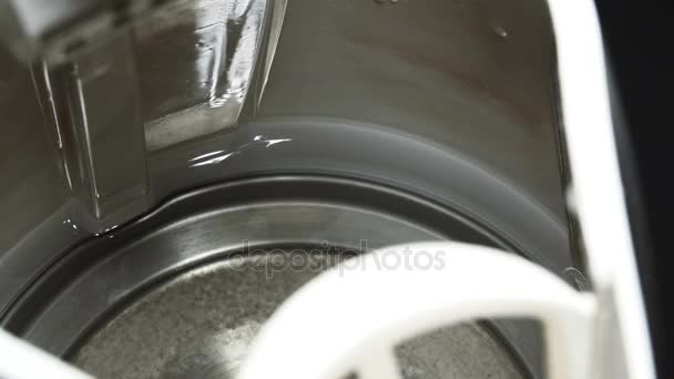 Close-up View of Pouring Water in Electric Kettle - Záběry, video