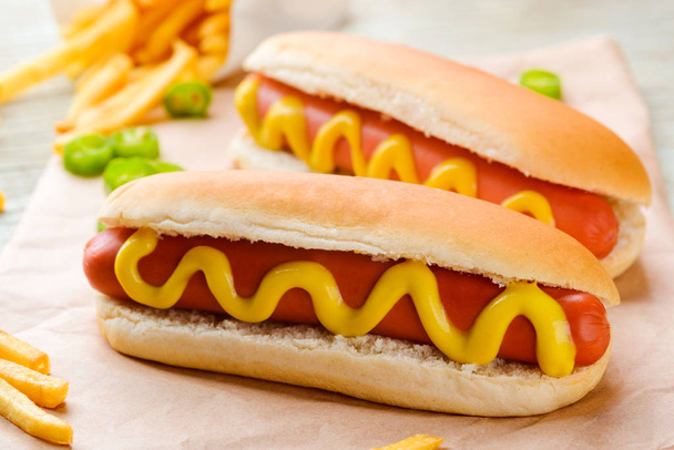 Hot dogs, pepper and fries - Фото, зображення