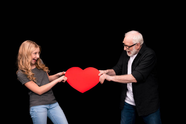 Grandfather and granddaughter with heart symbol  - 写真・画像