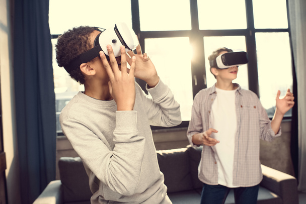 boys in virtual reality headsets - 写真・画像