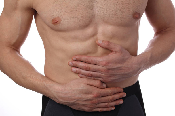 Man with stomach pain. Digestive system, Urinary Tract Infection problems. - Zdjęcie, obraz