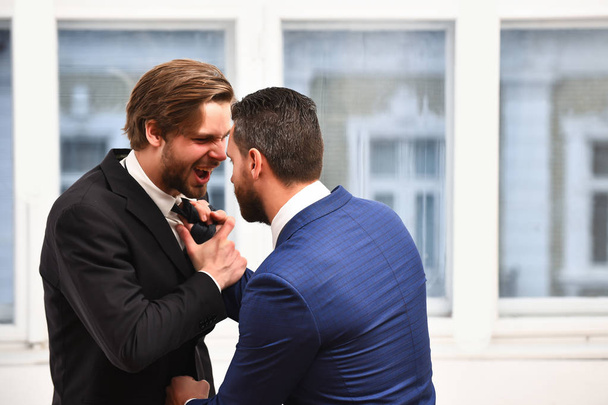 Rivalry and conflict concept. Business partners fight - Fotoğraf, Görsel