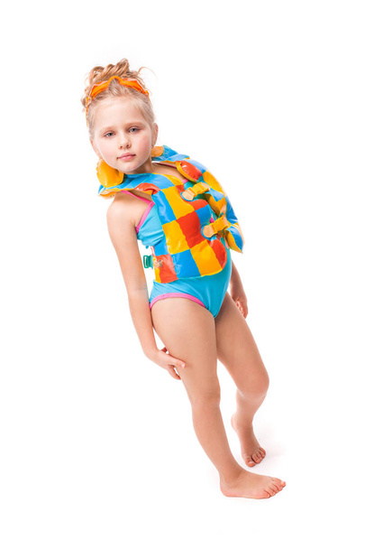 Tyttö uimapuku ja pelastusliivi
 - Valokuva, kuva