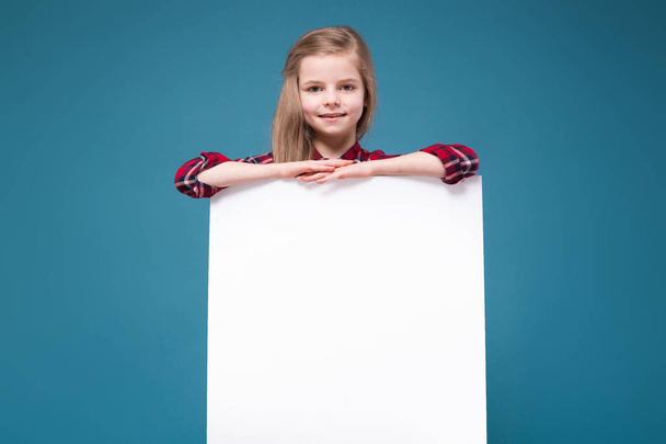 Little cut girl with empty poster - Foto, Imagen