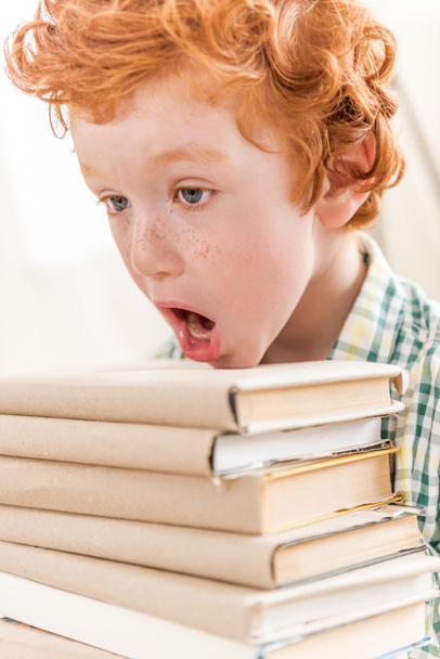 little boy and pile of books - Photo, Image