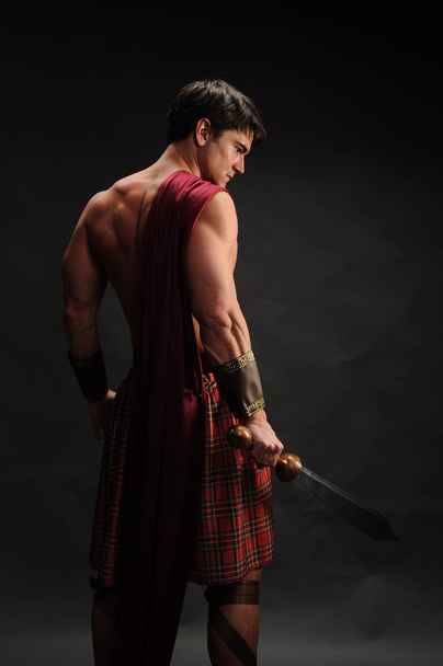 The loving highlander shows his muscles - Photo, Image