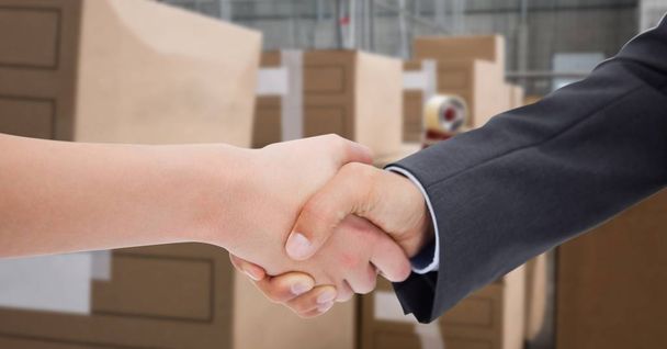 business people doing handshake in warehouse - Fotoğraf, Görsel