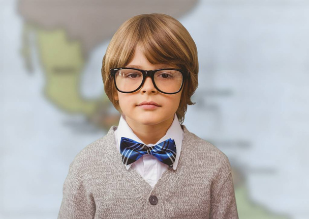 Boy genius against blurry map - Photo, image