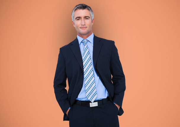 Confident businessman with hands in pockets - Photo, image
