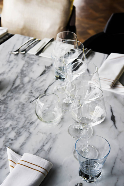Glasses on Table set prepared for dinner  - Fotografie, Obrázek