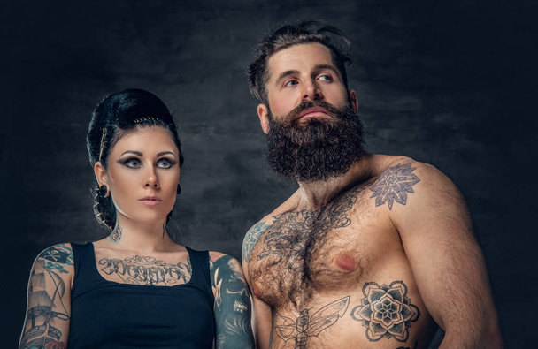 Tattooed male and brunette female - Photo, Image