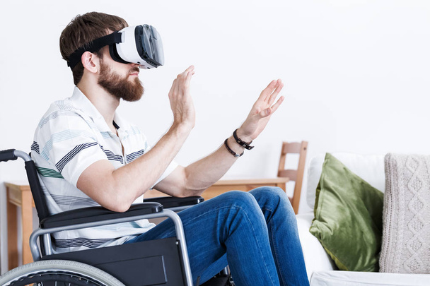 Man wearing virtual reality glasses - 写真・画像