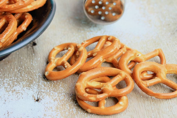 Salted pretzels on wooden - Photo, Image