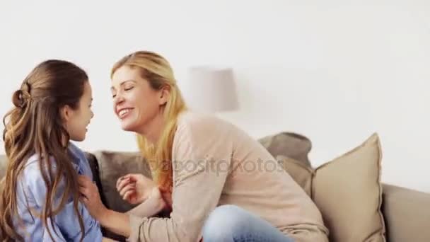 happy family having fun and tickling at home - Materiał filmowy, wideo