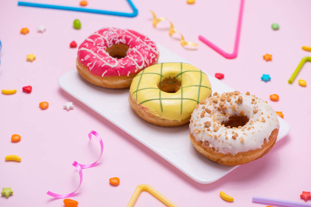 colourful donuts and party stuff  - Фото, изображение