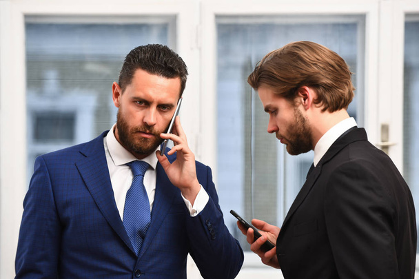 Office workers talking by phone. Business concept - Fotó, kép