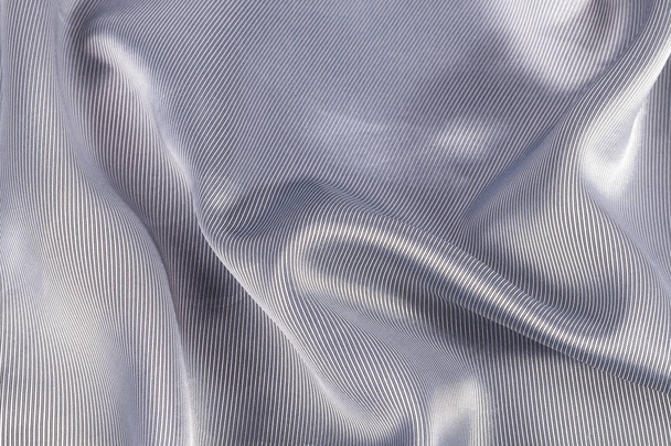 Шовковий фон, текстура сірої блискучої тканини
 - Фото, зображення