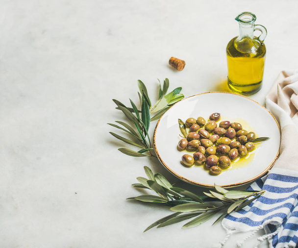 Pickled green Mediterranean olives - Фото, изображение