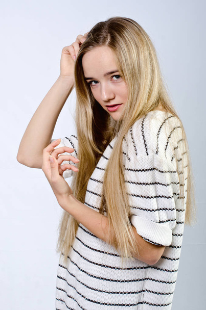 beautiful girl in striped sweater - Foto, immagini
