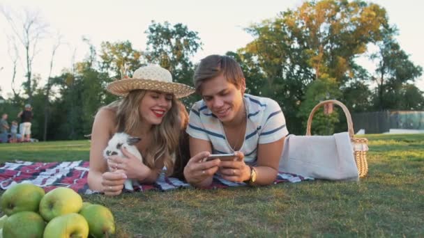 Couple on Picnic Resting With Rabbit - Záběry, video