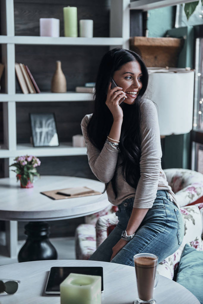 woman talking on mobile phone and smiling - Photo, Image