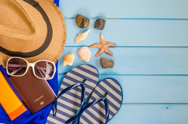 Accessories costume with travel for summer on blue wooden floor - Foto, Imagem