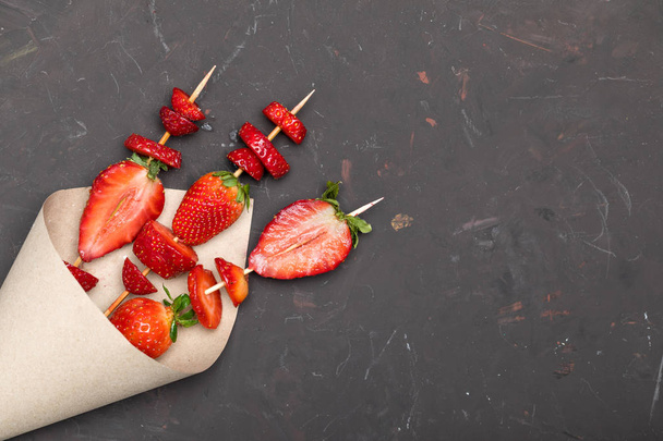 strawberries on wooden skewers - Photo, image