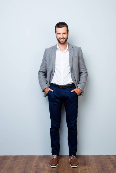 Vertical full-length portrait of handsome smiling happy successf - Photo, Image
