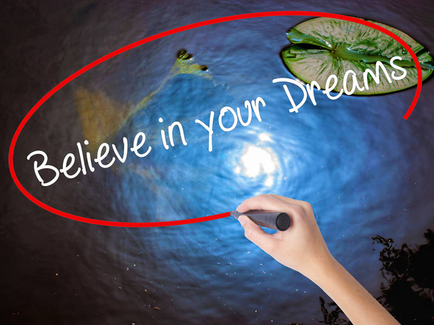 Woman Hand Writing Believe in your Dreams with marker over trans - Photo, Image