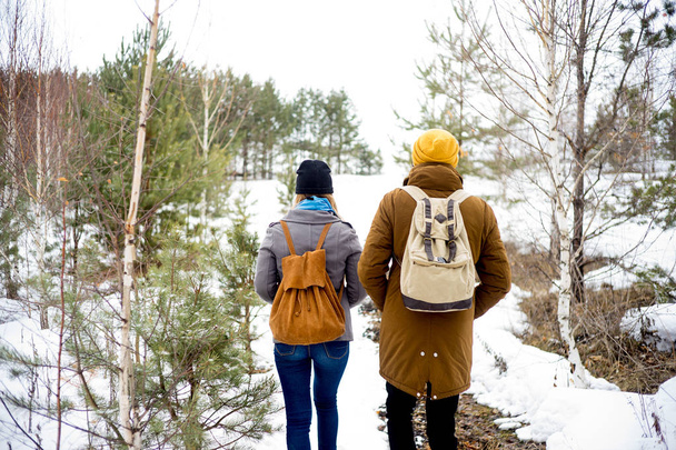 Couple hiking in forest - 写真・画像