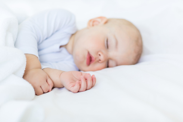alvó baba-fiú  - Fotó, kép