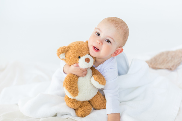 Baby boy with teddy bear   - Fotografie, Obrázek