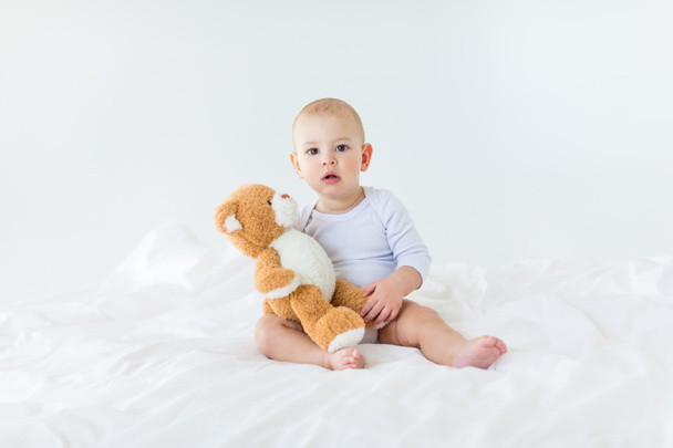 Baby boy with teddy bear   - Fotó, kép