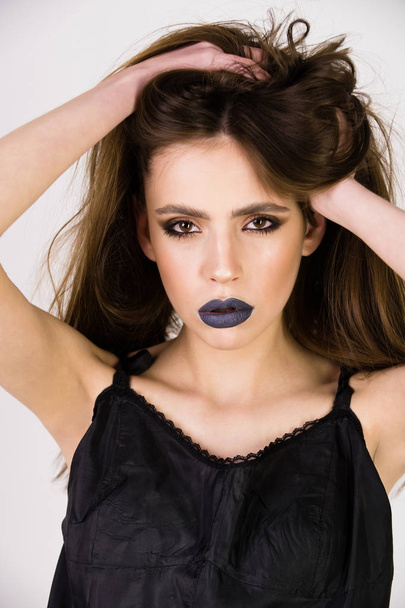 sexy woman with black lips, fashionable makeup and long hair - Fotó, kép