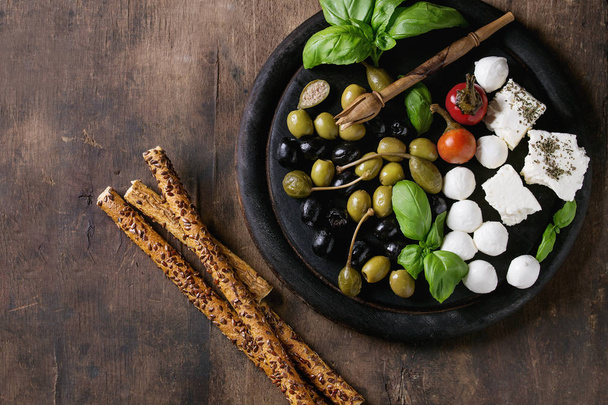 Mediterranean appetizer plate - Фото, изображение