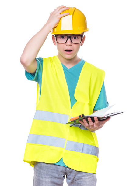Boy wearing yellow hard hat - Zdjęcie, obraz