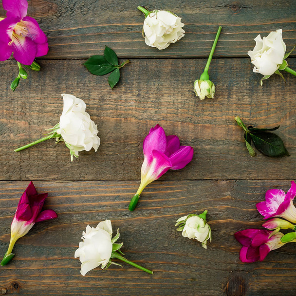 beautiful  flowers on wooden background - Photo, Image