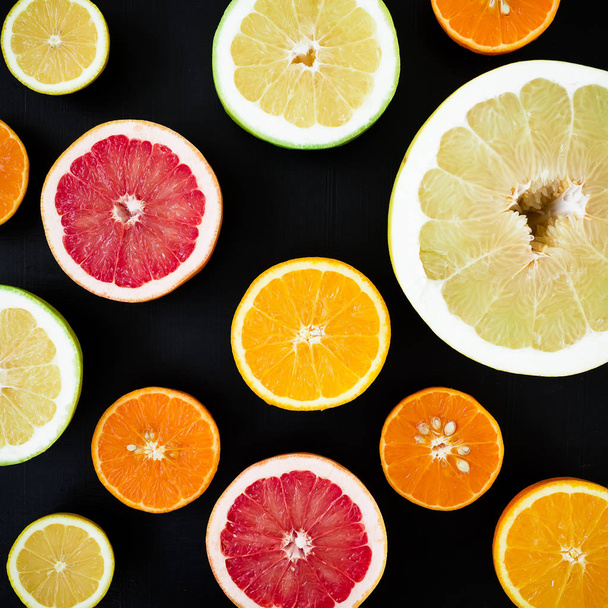 citrus fruits on dark background - Foto, Imagem