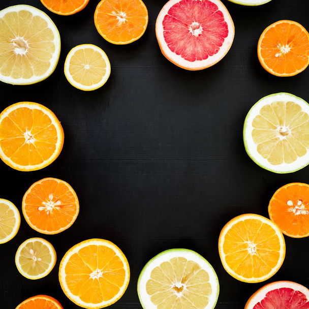 citrus fruits on dark background - Foto, Imagem