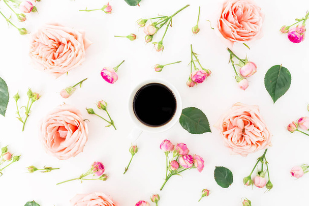 pink flowers and black coffee cup  - Zdjęcie, obraz