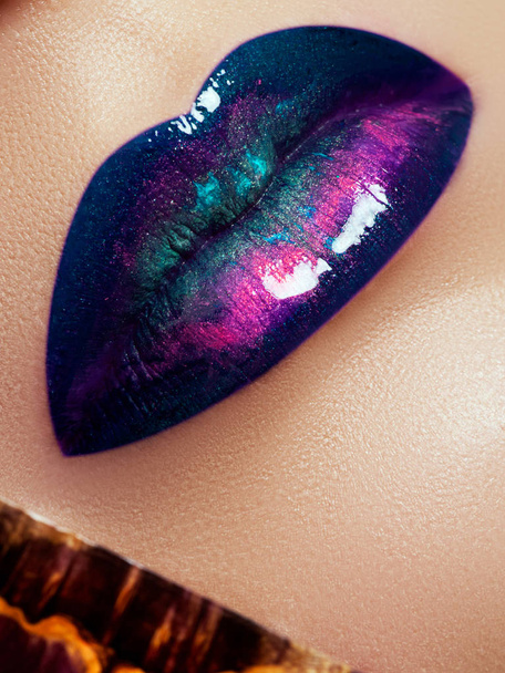 Closeup of beautiful full woman's lips with bright fashion gloss makeup - 写真・画像