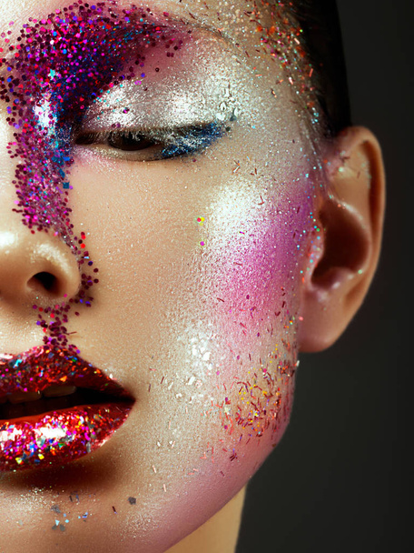 Beauty, cosmetics and makeup. Magic eyes look with bright creative make-up - Photo, Image