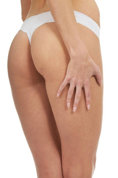 Sexy woman touching her thigh. - Zdjęcie, obraz