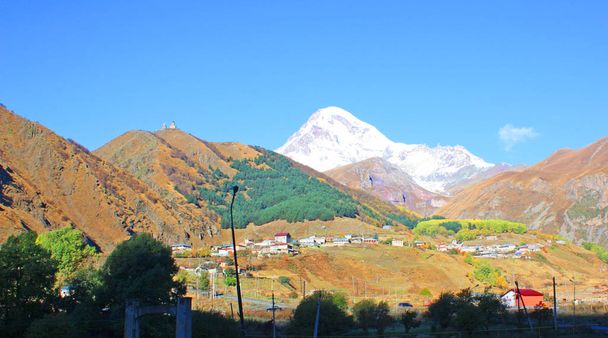 Гора Казбек в Грузии
 - Фото, изображение
