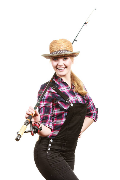 Happy woman in sun hat holding fishing rod - Foto, immagini