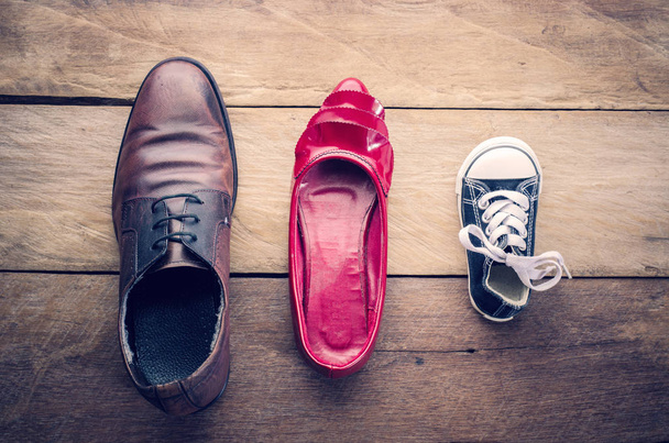 shoes, three pairs of dad, mom, son - the family concept - Foto, Imagem