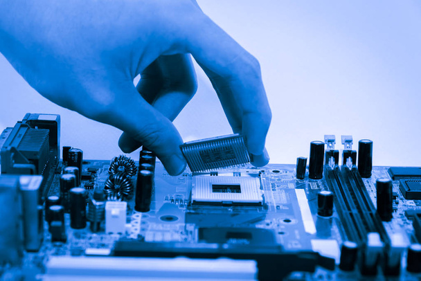 Close up of Electronic Circuits in Technology on   Mainboard background (Main board,cpu motherboard,logic board,system board or mobo) - Photo, Image