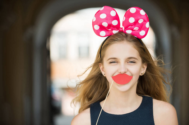 Happy pretty girl with cute mouse ears and red lips - Photo, Image